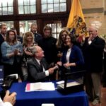 EOHSI/CEED Present During Gov. Murphy's Signature of New Legislation to Benefit NJ 911 Responders